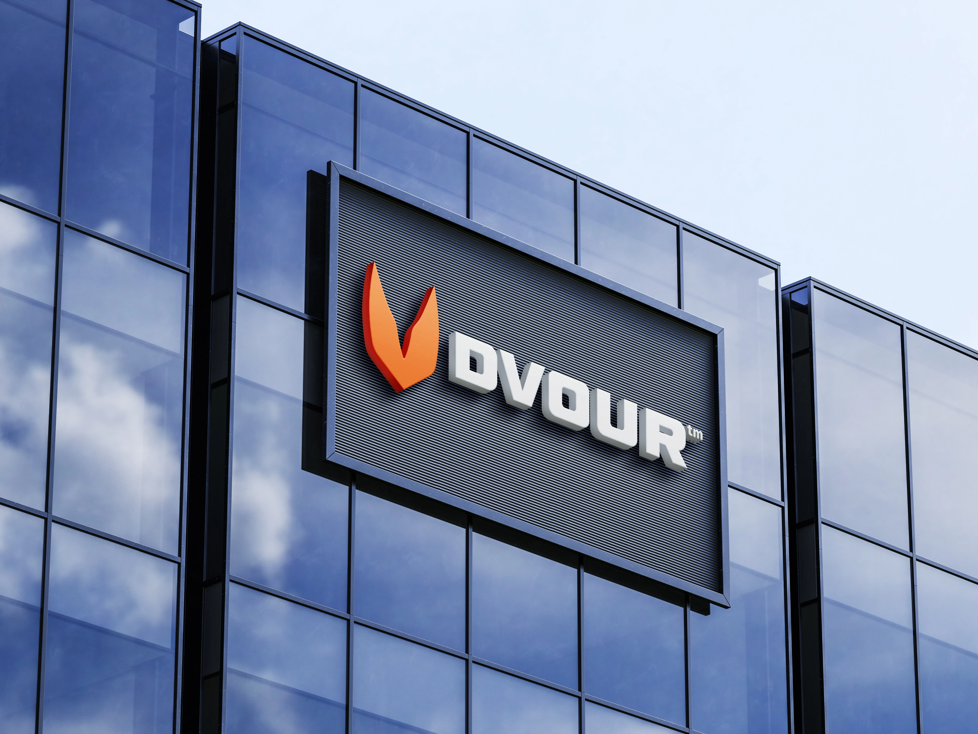 Cartelería corporativa: el imagotipo en volumen sobre la fachada vidriada de un edificio